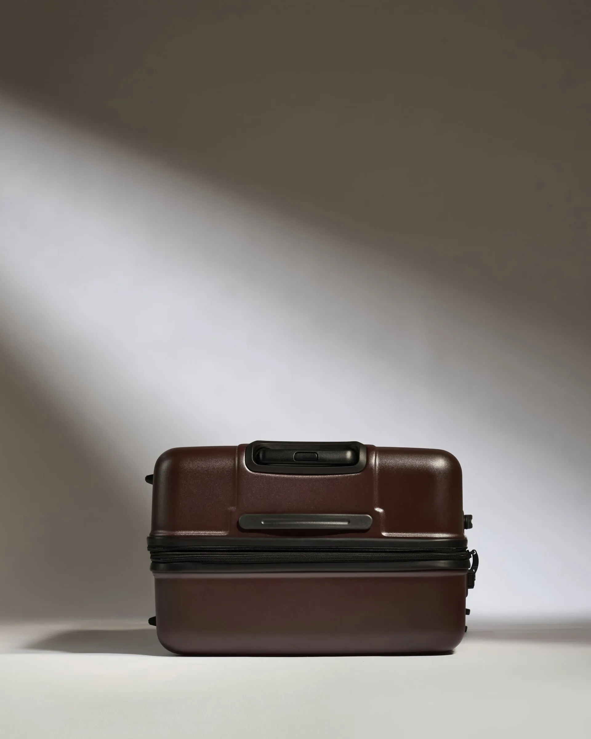 Large Suitcase in Cedar Brown - Logo