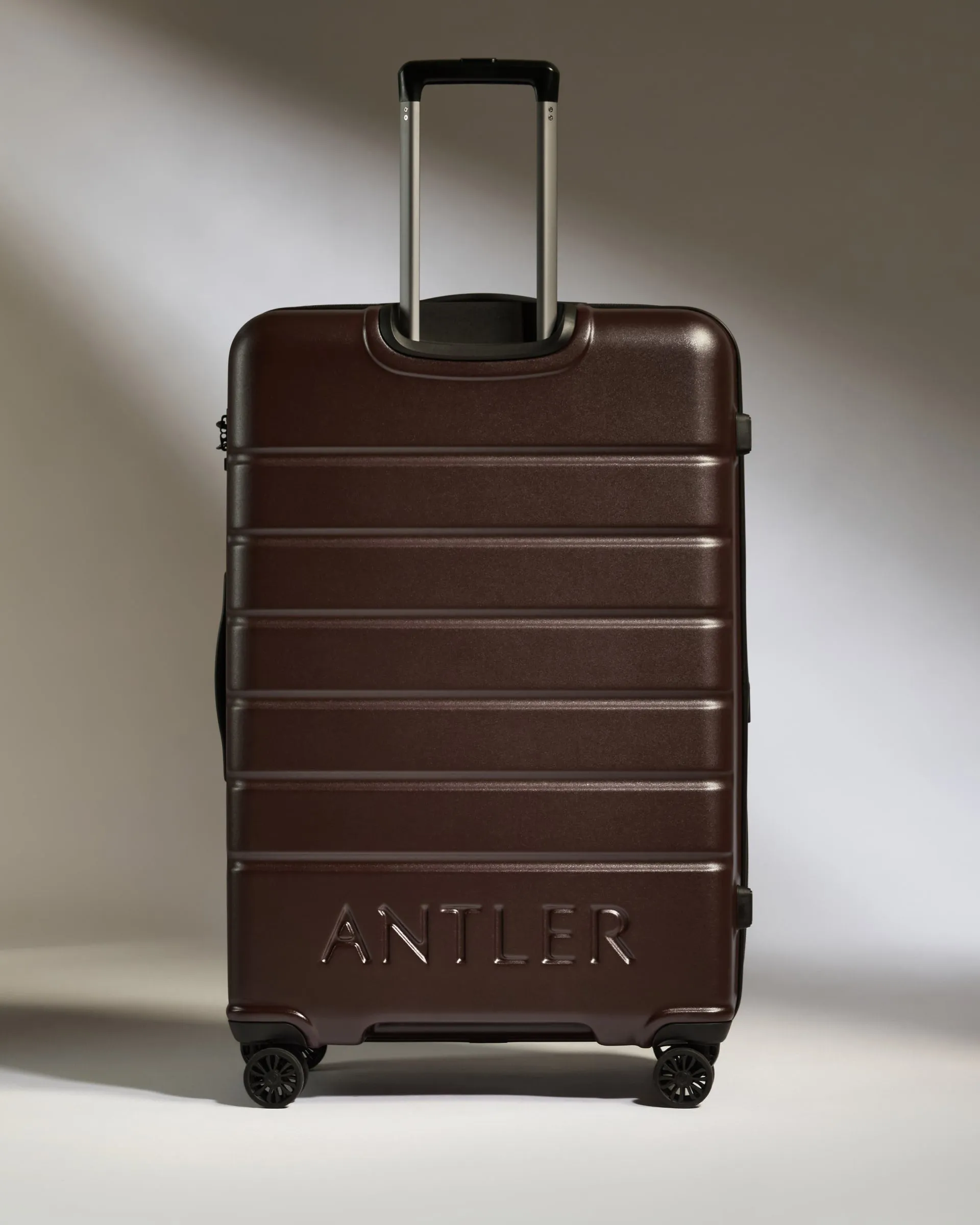 Large Suitcase in Cedar Brown - Logo