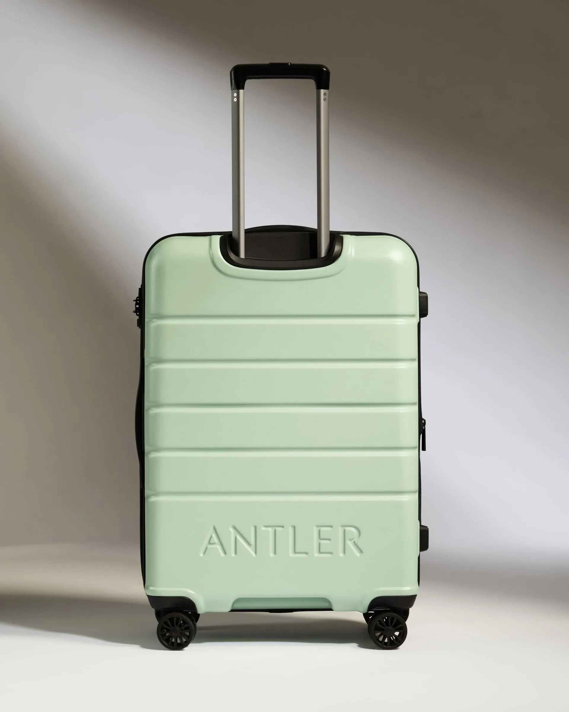 Medium Suitcase in Aspen Green - Logo